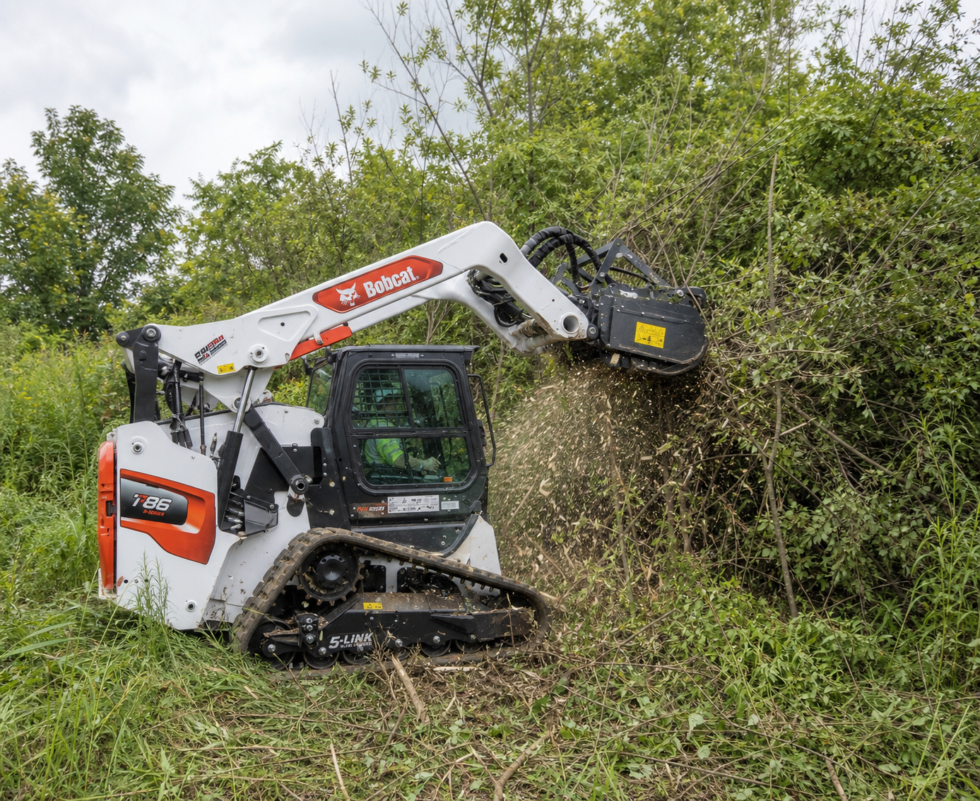Bobcat forestry mulcher cutting through dense brush