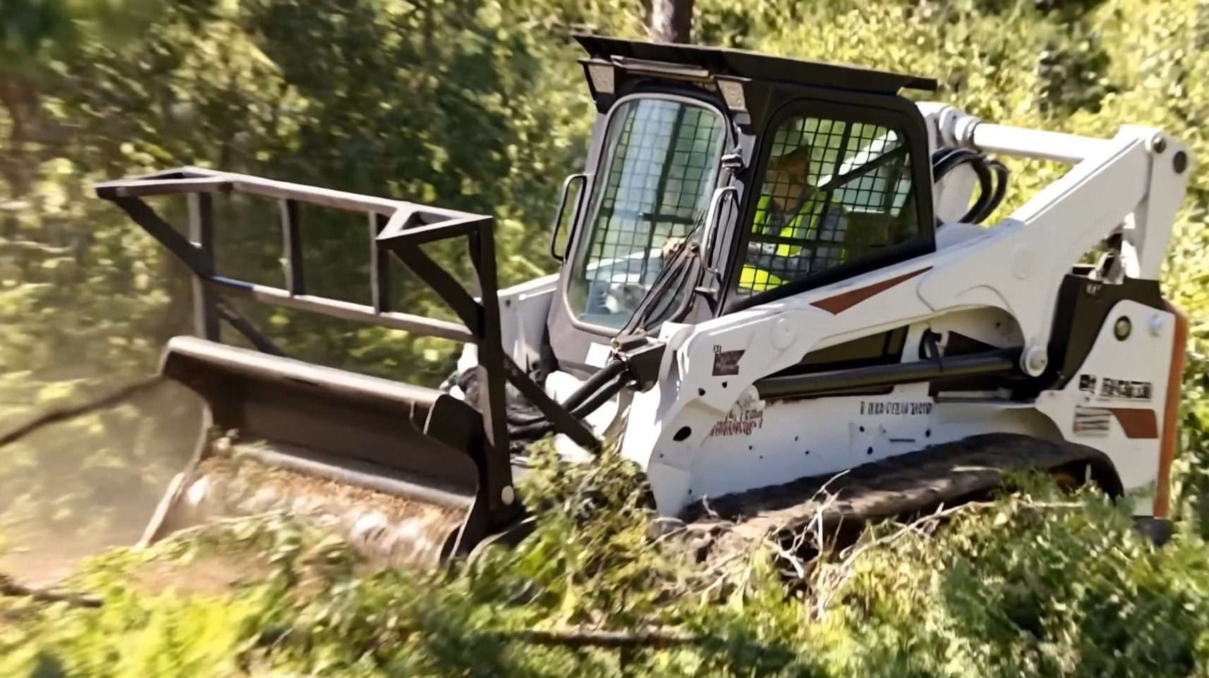 Forestry mulcher clearing a Maine camp lot or building lot